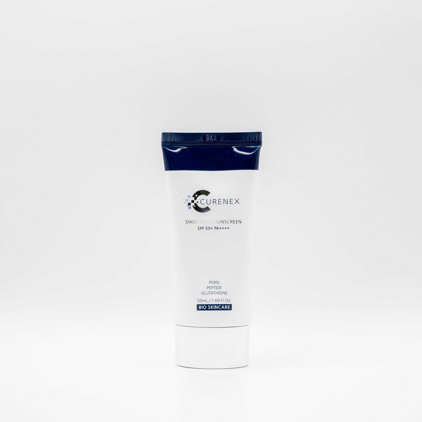 Curenex Salmon DNA Sheer Sunscreen SPF50+ in white and black tube for lightweight UV protection and skin hydration