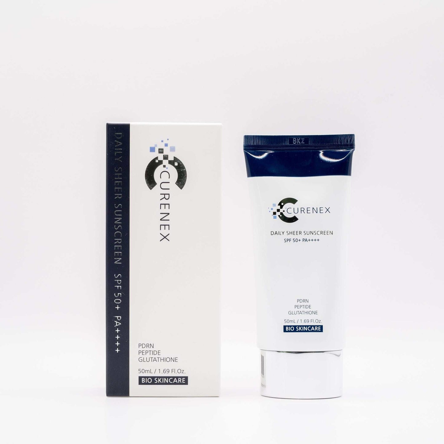Curenex Salmon DNA Sheer Sunscreen SPF50+ in white tube and box with blue accents for daily UV protection and hydration